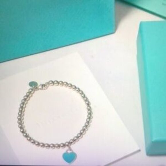 Tiffany & Co. Silver Bracelet with Blue Heart Charm - Picture 2 of 4